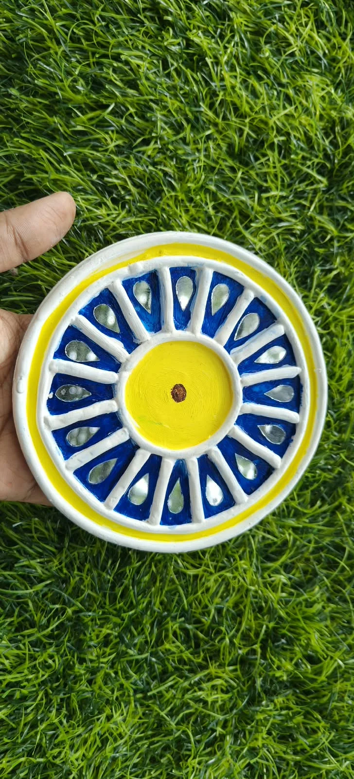 Handmade circular Lippan art, blue & yellow design