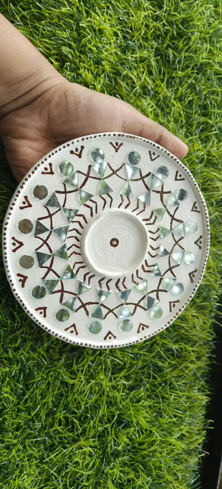 Handmade circular Lippan art, folk patterns design