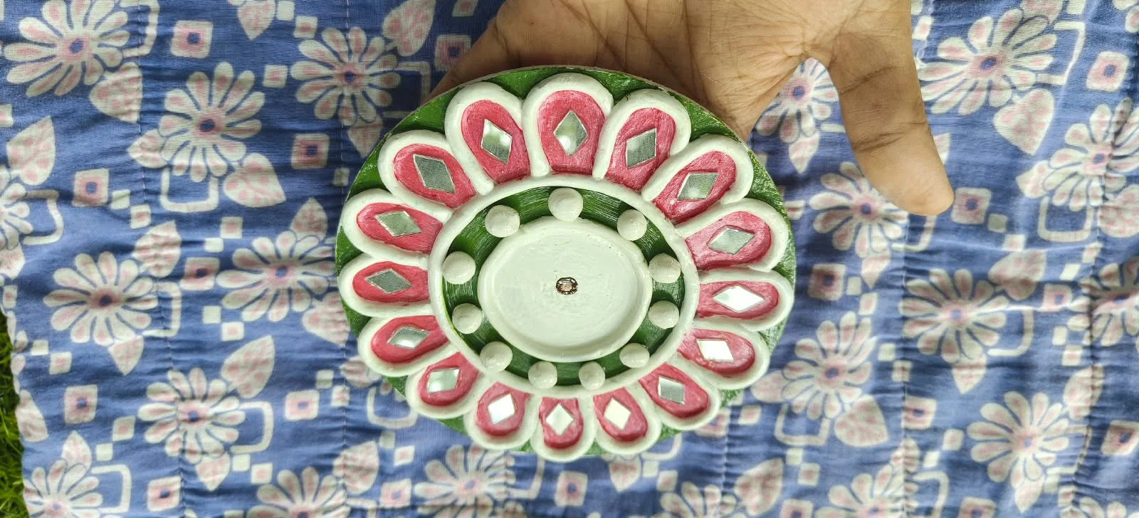 Handmade circular Lippan art, pink & green design