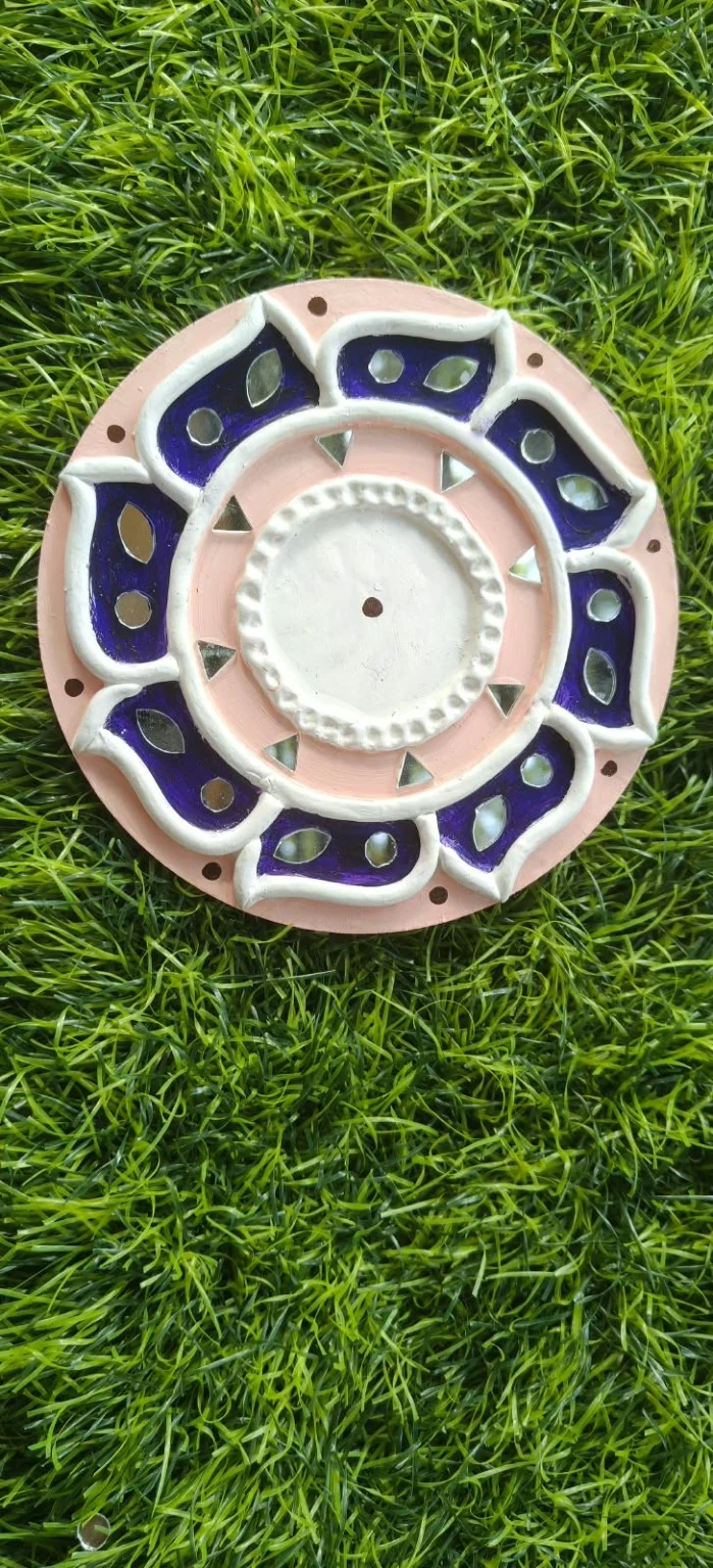 Handmade circular Lippan art, purple petals design